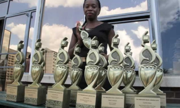 ZIMA's Farai Chapoterera with the trophies. Photo: herald.co.zw