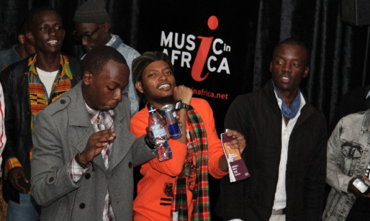 Fans dance at the concert. Photo by Edwin Machuka