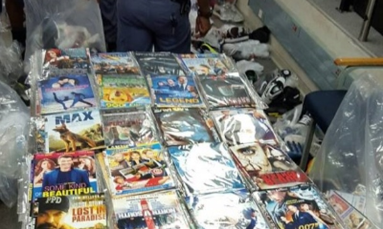 Some of the pirated DVDs confiscated by police during the recent bust in Johannesburg. Photo: mybroadband.co.za