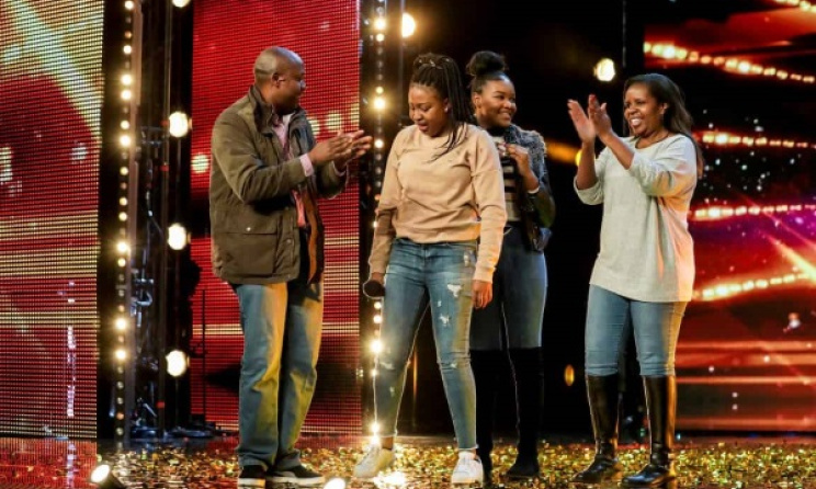 The 15 year old Sarah Ikumu with her family. She got a direct pass to the semi-final.  Photo: Twitter