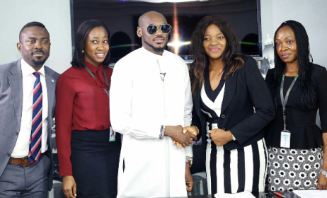 2baba, centre, at NYPF signing ceremony in Lagos. Photo: BellaNaija