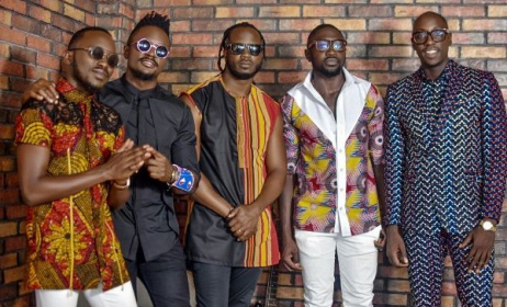 Members of Sauti Sol with Bebe Cool (middle).