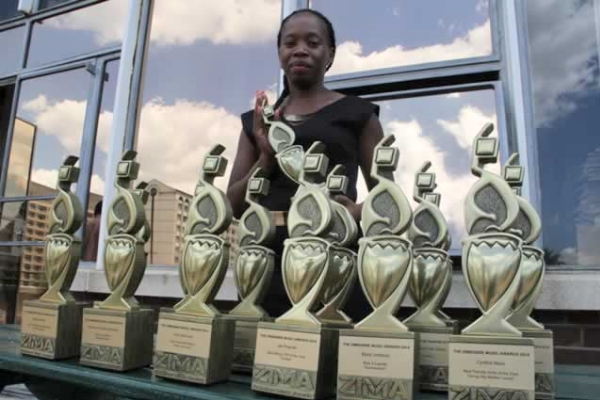 ZIMA's Farai Chapoterera with the trophies. Photo: herald.co.zw