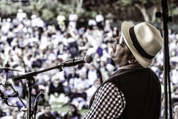 John Hassan on stage. Photo: Facebook