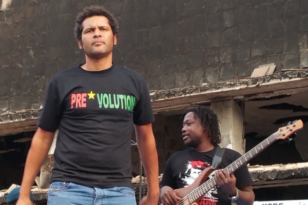 Smockey at the 5 March concert in front of the ruins of the National Assembly.