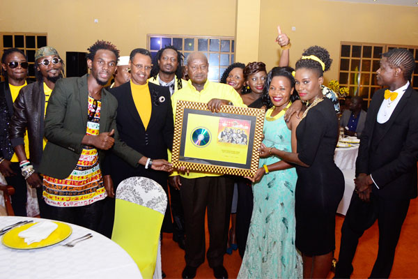 Ugandan artists with President Museveni. Photo: www.chano8.com
