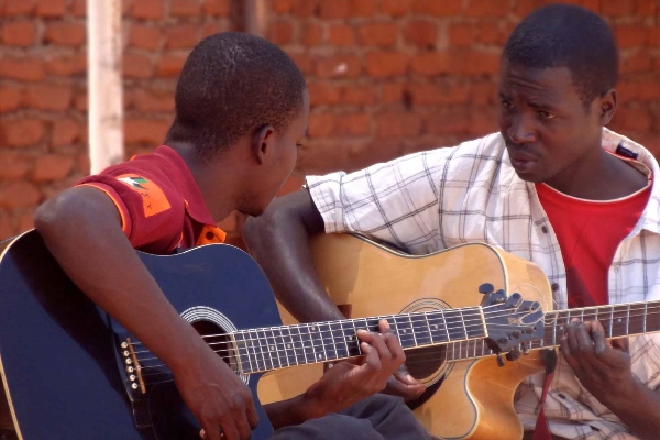 Guitar lessons at Music Crossroads Malawi. Photo: Facebook