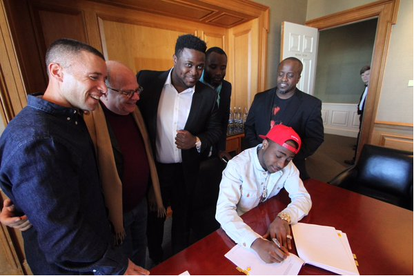 Davido signs with Sony Music.