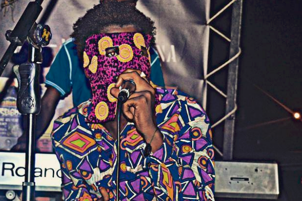 Trap artist Hym performs with mask. Photo: Facebook