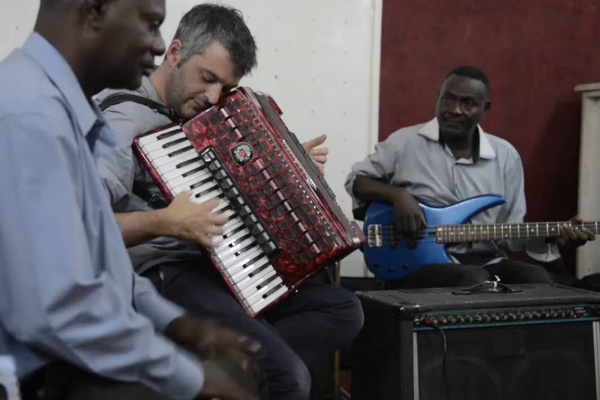 Accordian player Ilan Moss jams with Sudanese musicians in Khartoum. Photo: Vimeo