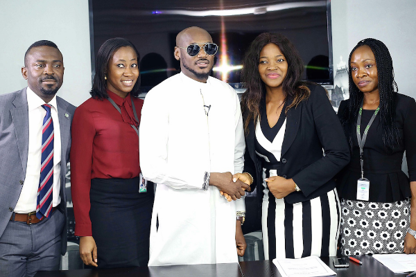 2baba, centre, at NYPF signing ceremony in Lagos. Photo: BellaNaija