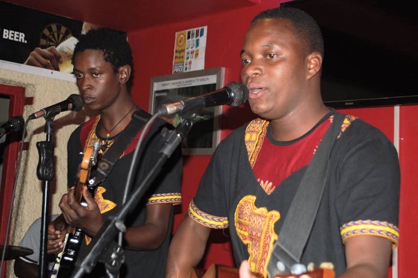 Yulesis Katoto (right) and Deep Roots performing in Gweru. Photo: Innocent Tinashe Mutero