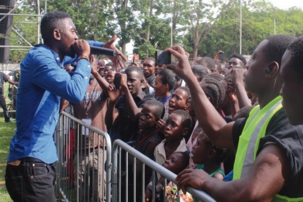 Zambian artist B Flow entertains the crowd at a live event. Photo: www.daily-mail.co.zm