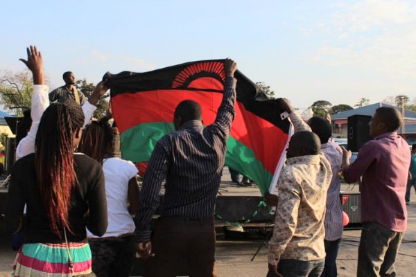 Music fans raise the Malawian flag at the 2014 Ufulu Festival. Photo: Ufulu Festival / Facebook