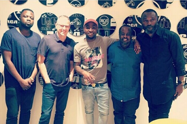 Davido, middle, with David Edge of RCA, second left. Photo: Instagram
