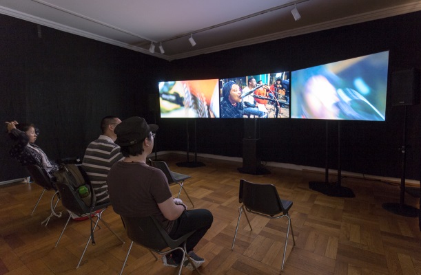 Audiences watch Philip Miller's sound installation 'BikoHausen' in Germany. Photo: Daniel Pafe / IMD