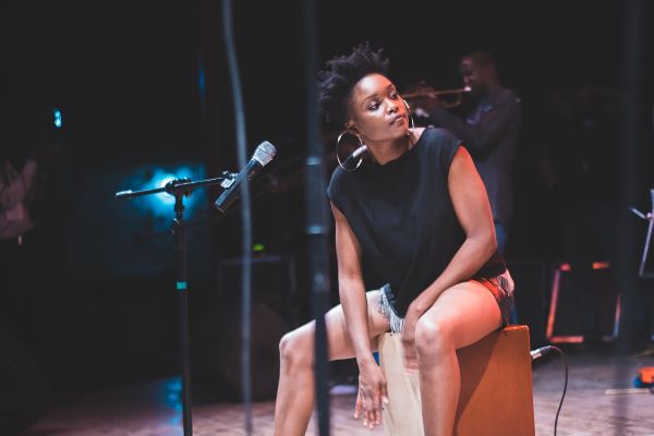 Falana playling the cajón. Photo: Falana Music