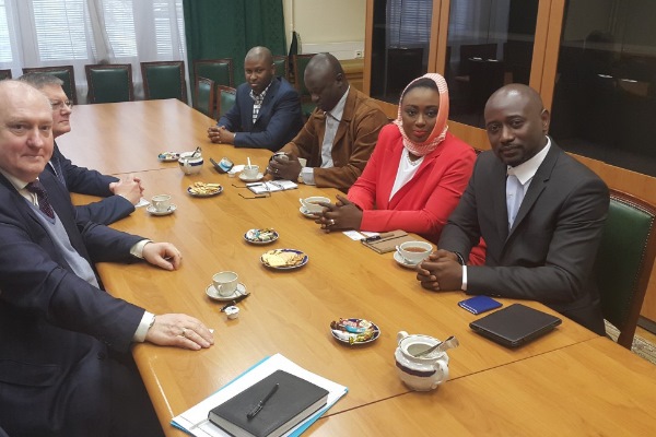 Lamin Manga, first right, has signed a deal allowing more attention to Gambian music in Russia. Photo: Freedom Newspaper