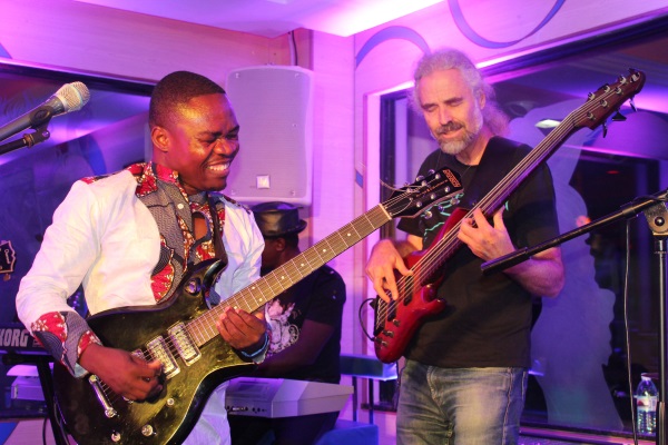 Charmant Mushaga joined by Chris Weigers. Photo courtesy of Roy Ruva