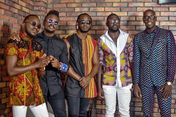 Members of Sauti Sol with Bebe Cool (middle).