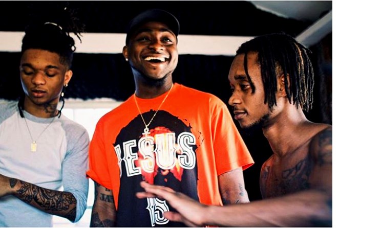 Davido, centre, with Rae Sremmurd. Photo: Instagram