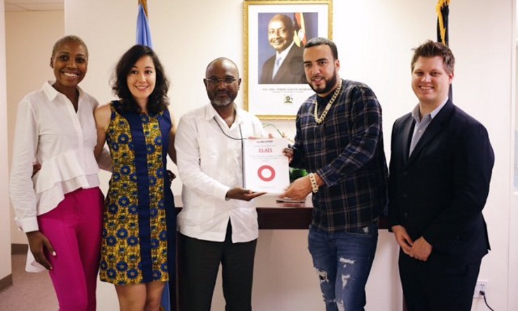 French Montana poses with Uganda's ambassador to the UN, Dr Adonia Ayebare, on 25 July.