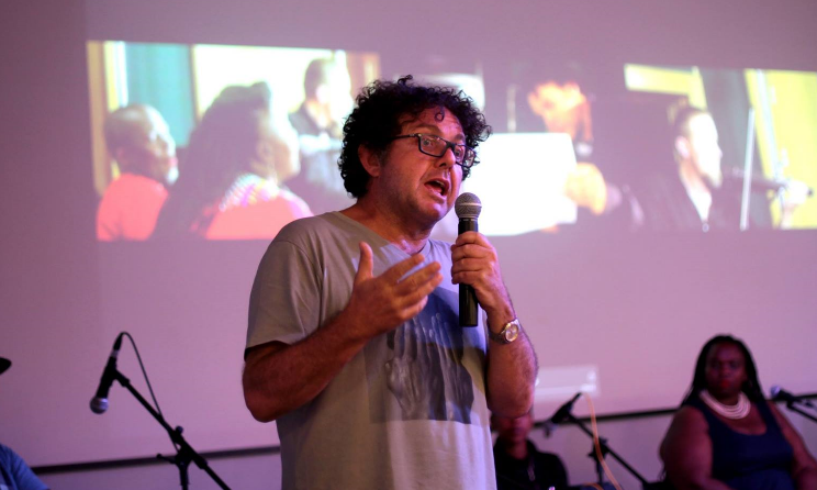 Philip Miller addresses the audience during the BikoHausen multimedia exhibition at Goethe-Institut Johannesburg in April 2017.