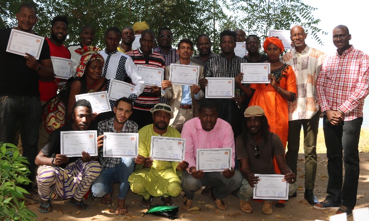 Participants of the recently held music workshop pose with their graduation certificates in Ségou, Mali.