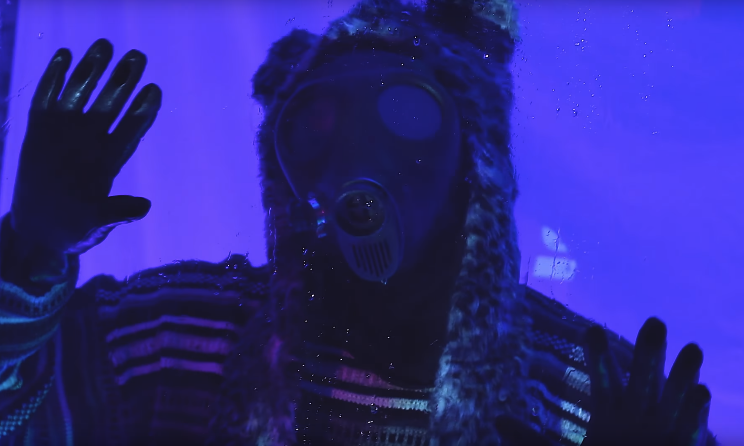 A still frame from District 9ine's 'Feed Back' video.
