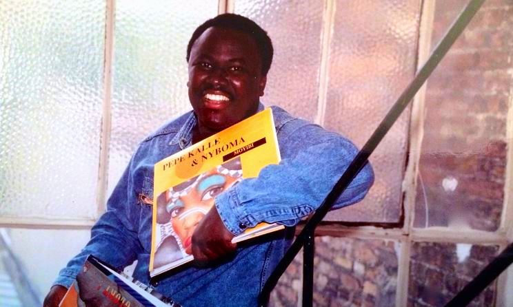 Ibrahim Sylla clutching a record by Nyboma in 1989. Photo: Wikipedia