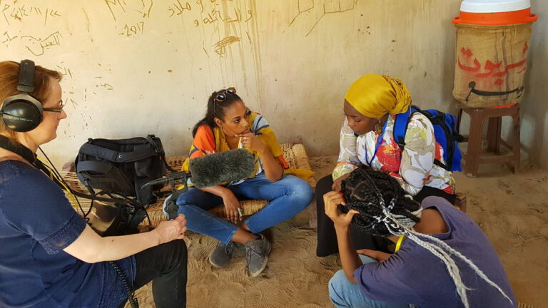 Documentary maker Yousra Elbagir (middle).