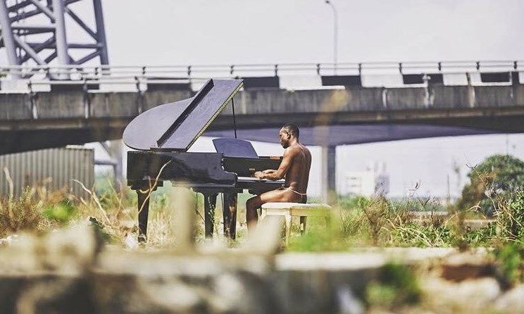 Brymo goes naked in the video for 'Heya'.