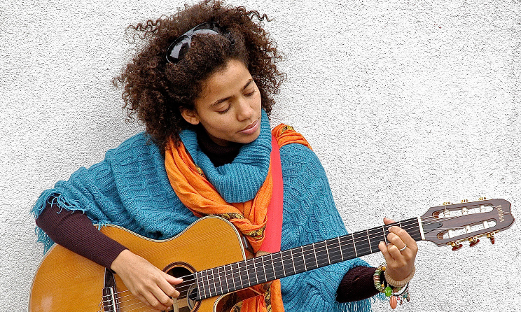Nneka speaks about social ills and personal experiences in her music.