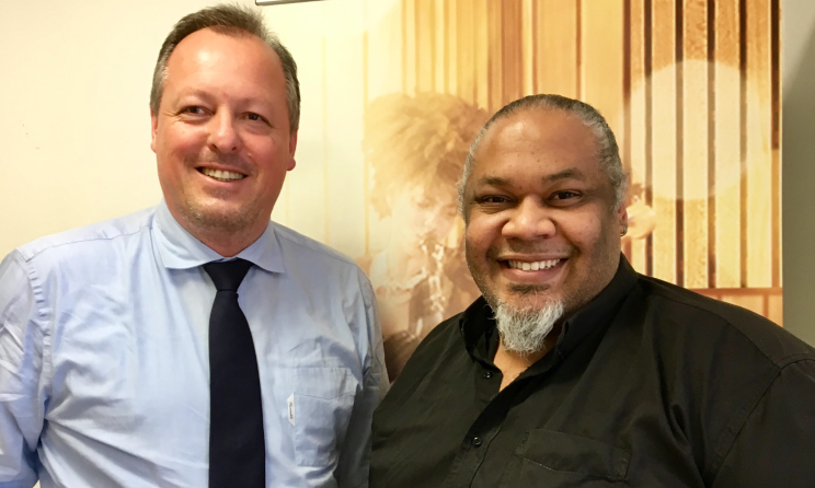 AMI general director Nicolas Boudeville and the university's rector Michael Sean Harris.