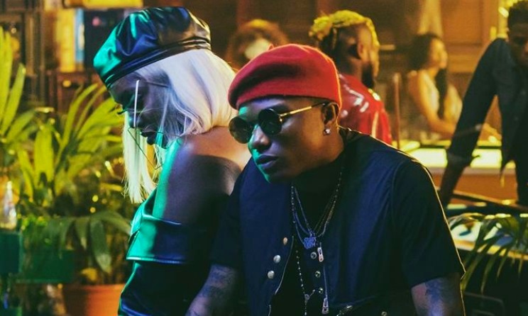 Wizkid poses with Tiwa Savage. Photo: MAVINS
