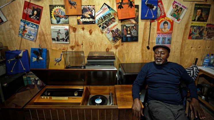 James Ragumi at his Kenyatta Market record store. Photo:Ilwareed Online.