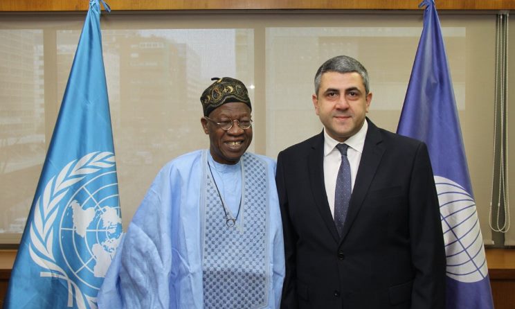 Nigeria's minister of information and culture Lai Mohammed poses with secretary general of the UN UN World Tourism Organisation Zurab Pololikashvili.