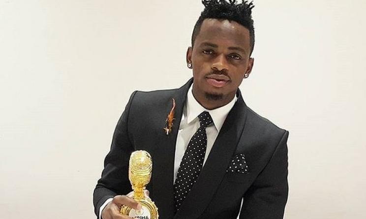 Diamond Platnumz with an AFRIMA trophy.