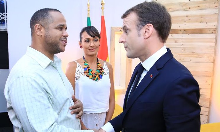 Sam Onyemelukwe of Trace speaks to French President Emmanuel Macron.