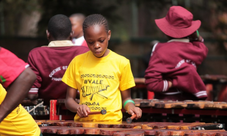 Zimbabwean locals schools performing at Prince Edward High School in Harare.
