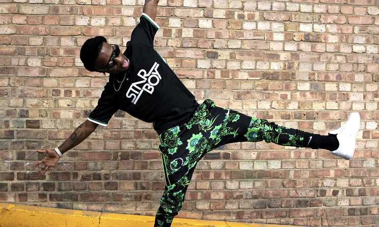 Wizkid wears his Nike By Wizkid jersey. Photo: Nike