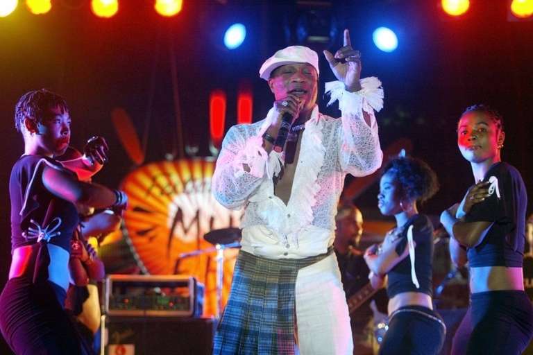 Koffi Olomidé, le roi de la rumba congolaise lors d'un concert à Dakar (Sénégal) en 2005. (Photo) : Seyllou/AFP.