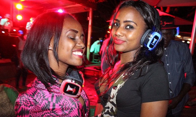 Kenyans don't seem to enjoy local music very much, according to a recently published survey. In the picture: Partygoers pose for a photo during a silent disco event at Gallileo Lounge in Nairobi, Kenya.