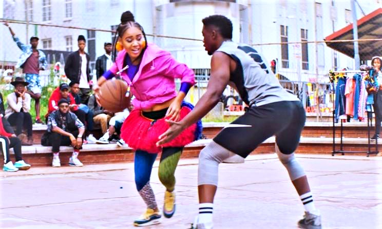 South African artist Sho Madjozi shows off her ball skills in 'Trickshot'.