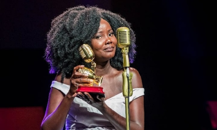 Sandra Nankoma posing with her AFRIMA statuette in 2018.