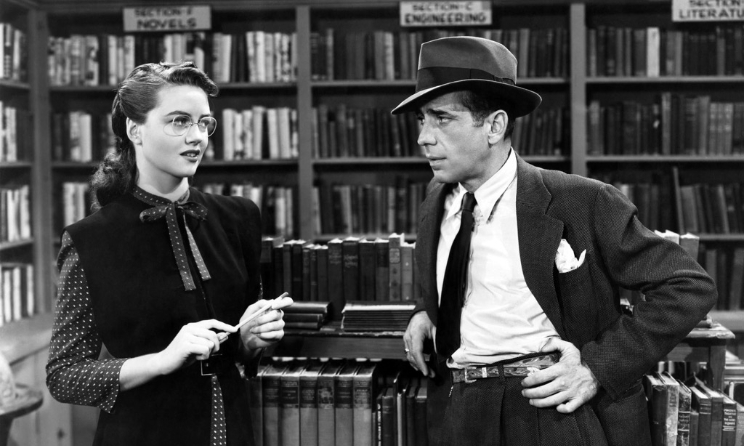 Dorothy Malone and Humphrey Bogart as detective Philip Marlow in The Big Sleep (1946).