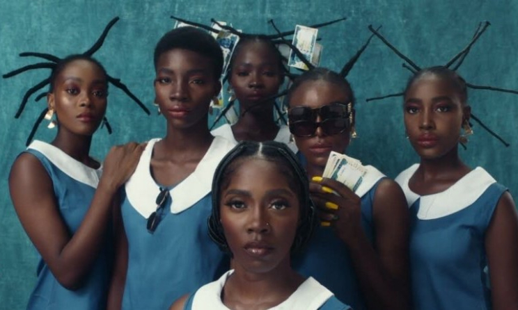 Tiwa Savage 49 people sitting and 99 standing