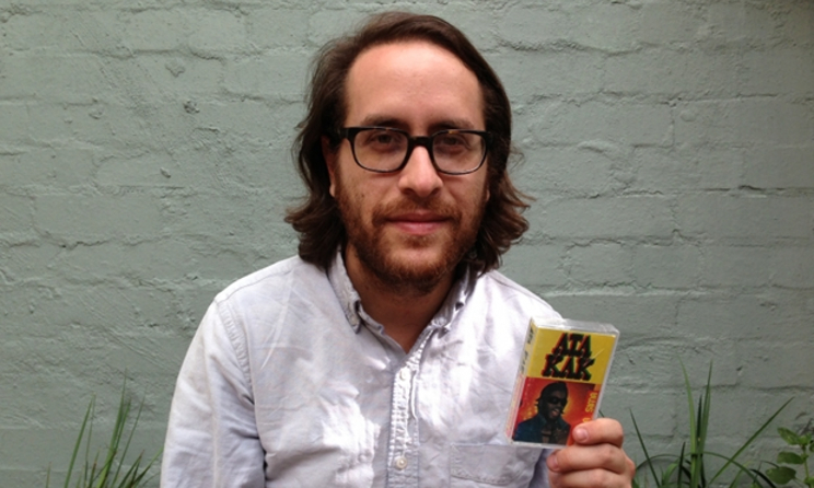 Brian Shimkovitz holding an Ata Kak tape.