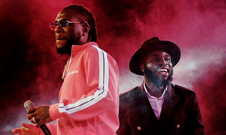 Burna Boy and M.anifest performing together at Manifestivities 2019. Photo: Azumi Habib