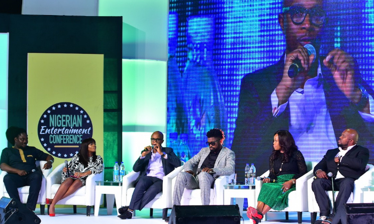 A panel discussion at a previous NECLive event.
